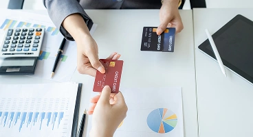 Checking and reviewing credit score with financial documents